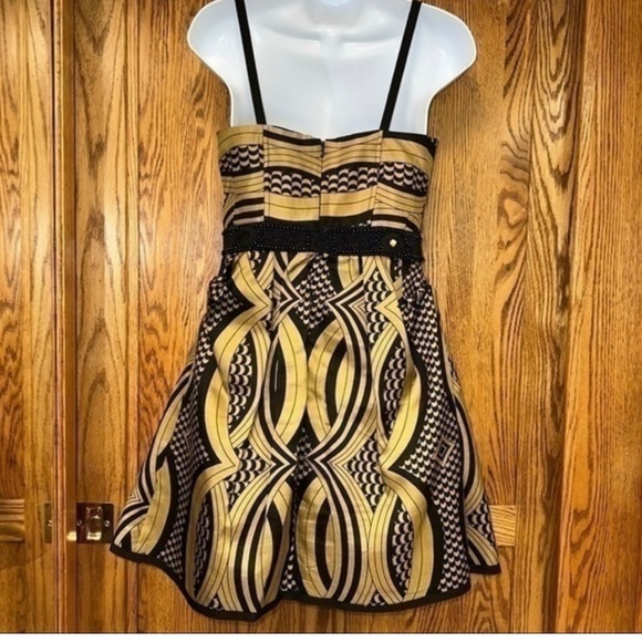 Nanette Lepore size 2. Gorgeous Black and gold Cocktail dress . Beaded waist . - Picture 2 of 6